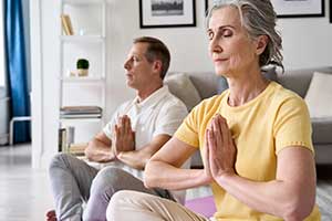 Ehepaar bei der Meditation